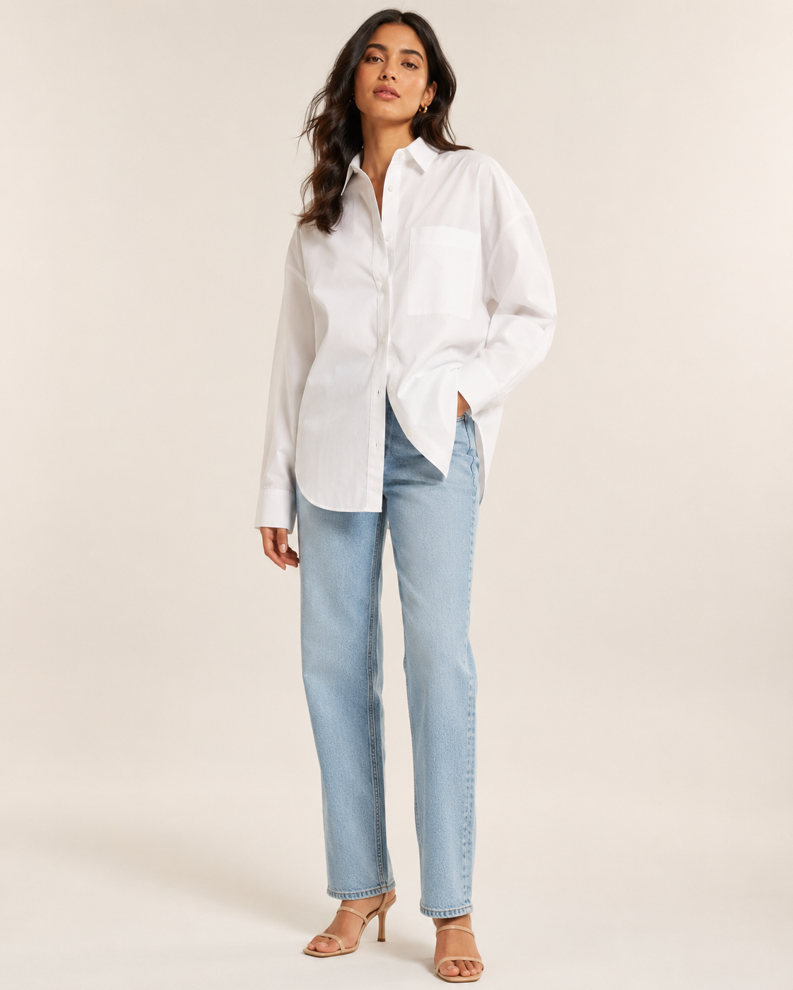 Woman wearing the Dezire Cloud oversized white shirt