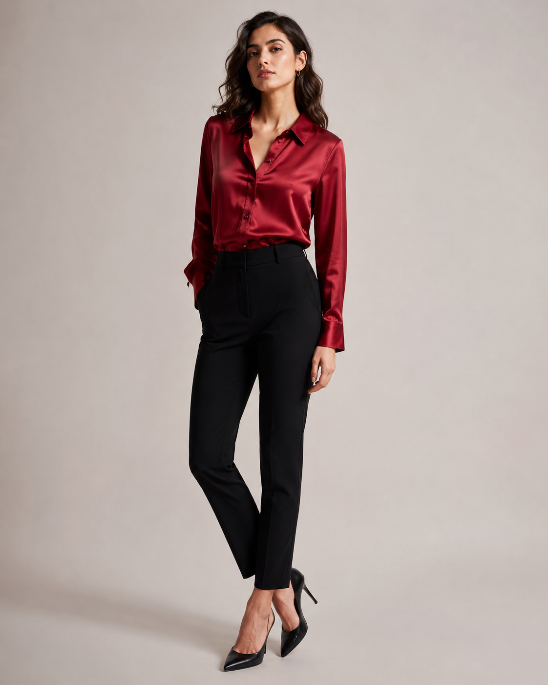 Woman wearing the Dezire Rouge deep red satin shirt