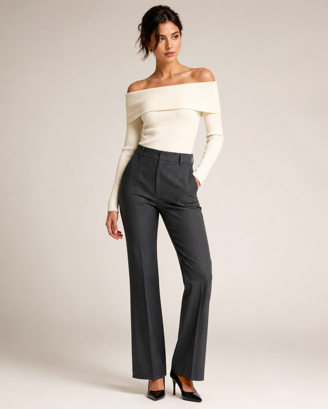 Woman wearing the Dezire ivory off-shoulder ribbed top