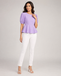 Woman wearing the Dezire Lilac lavender peplum top