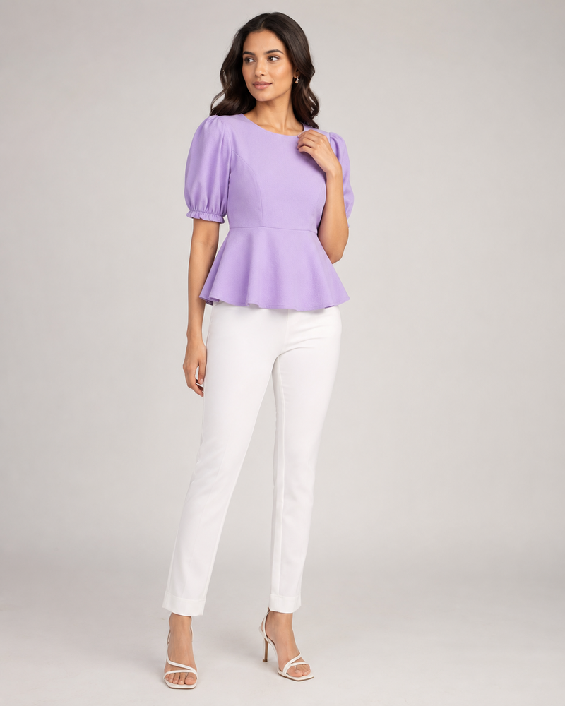 Woman wearing the Dezire Lilac lavender peplum top