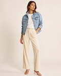 Woman wearing the Dezire Weekend light blue denim jacket