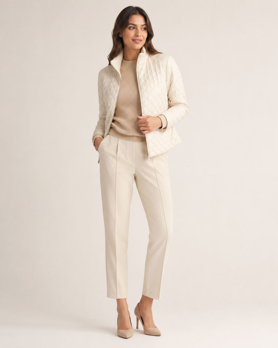 Woman wearing the Dezire Alpine ivory quilted jacket