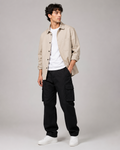 DEZIRE black relaxed cargo pants for men on a studio model