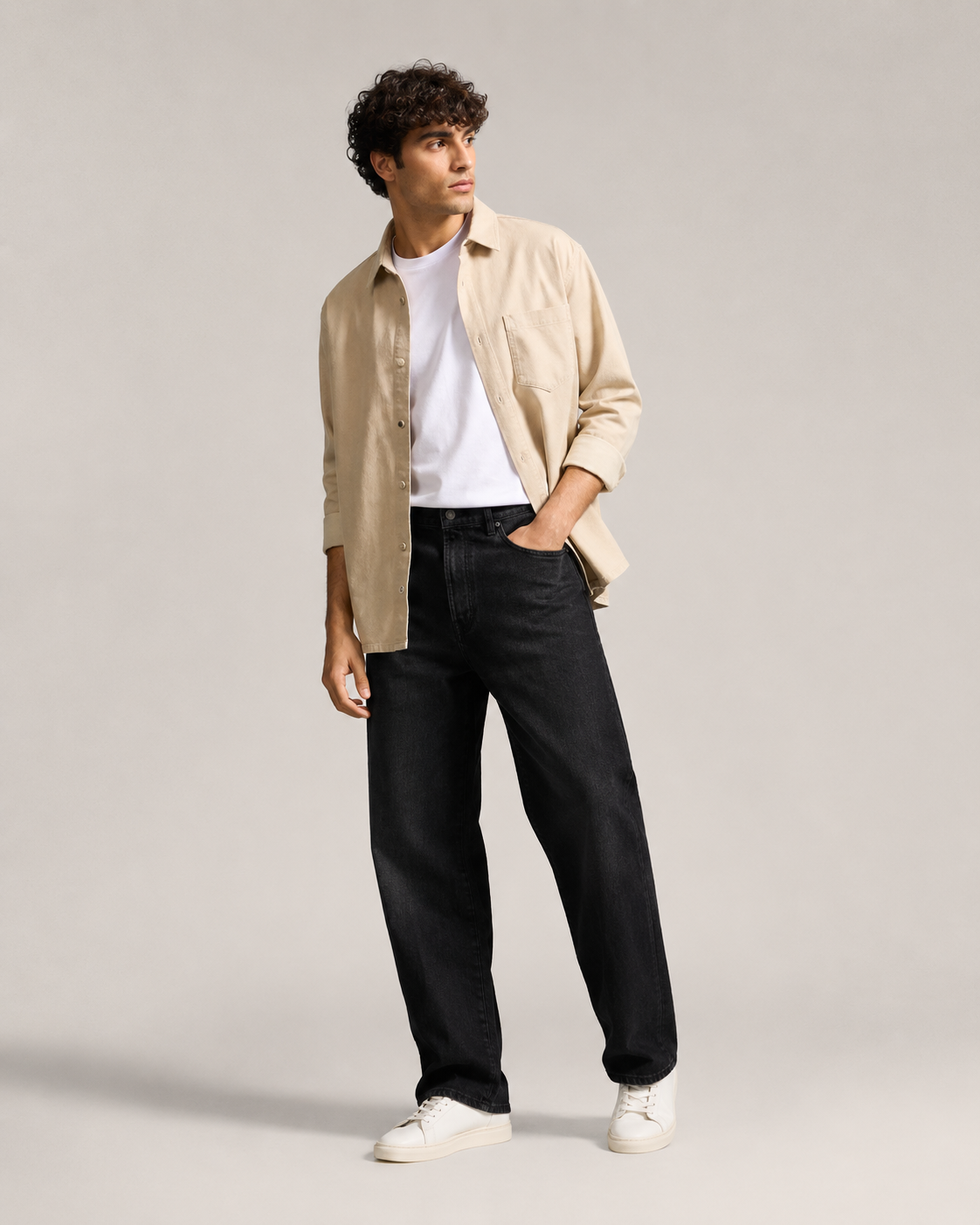 DEZIRE black relaxed fit jeans for men on a studio model