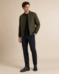 Man wearing the Dezire Flight olive bomber jacket
