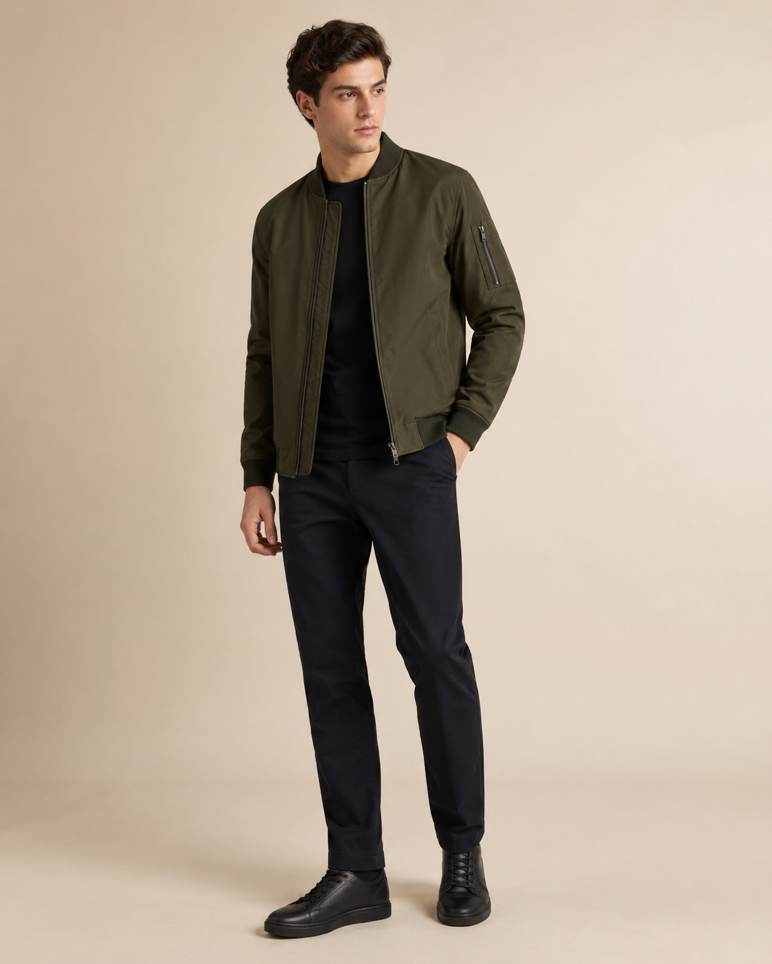 Man wearing the Dezire Flight olive bomber jacket