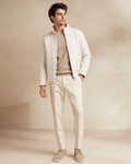 Man wearing the Dezire Summit ivory quilted jacket